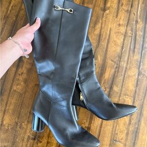 Coach Black Knee-High Heeled Boots with Gold Accent